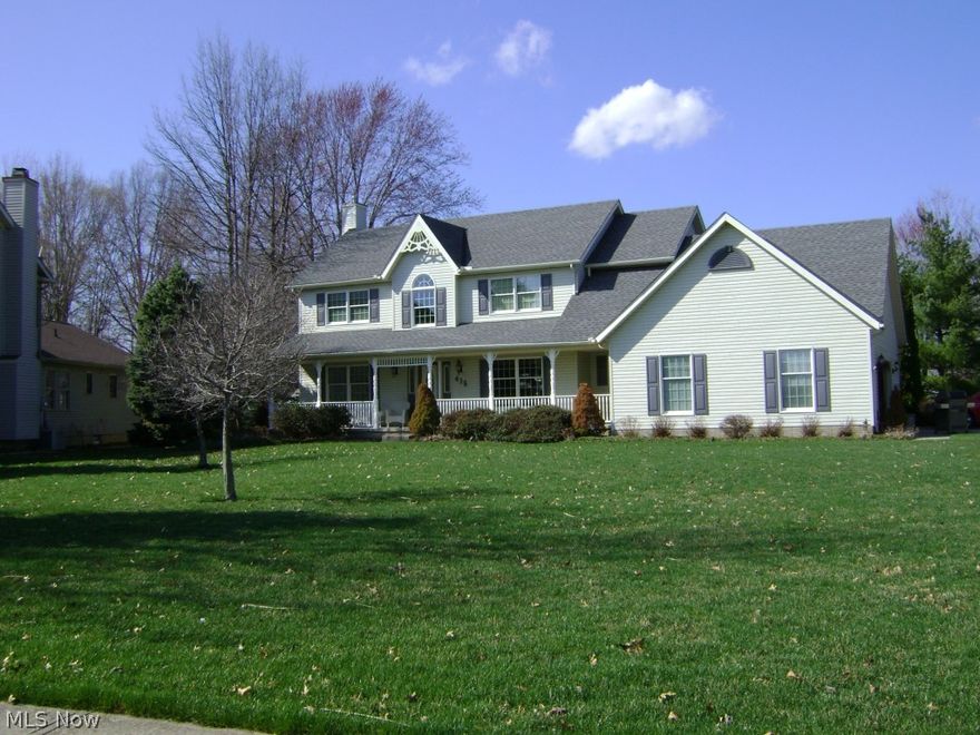 Geo thermal heat. Kitchen features granite counters and wine bar.  Master suite has 2 walk-in closets, his and her vanities in bathroom and new granite shower. Heated garage. Large Deck, stained last year and private stoned patio area for entertaining crowds. Basement features weight or room or 4th bedroom.