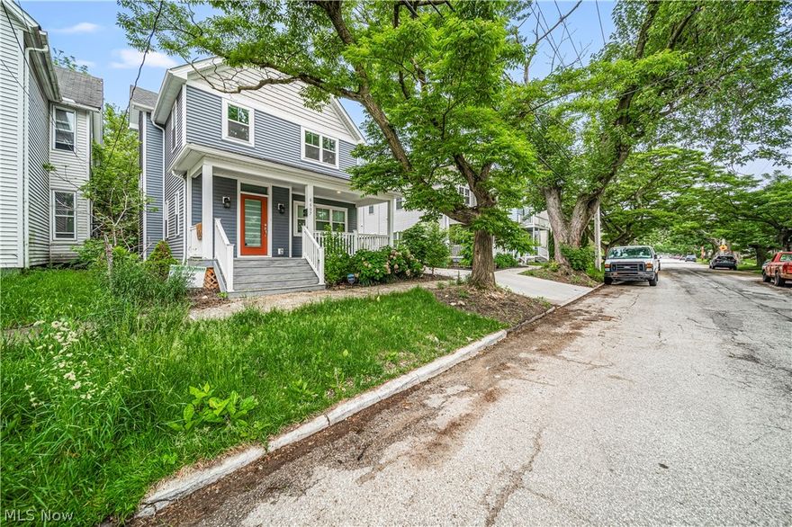 Move right in! Newer construction with tax abatement, attached 2-car garage with yard space close to the restaurants and theaters of Gordon Square. Three bedroom, two and a half baths with generous master bedroom with two walk in closets and private bath with tile shower, double vanity . Open first floor plan with spacious living and dining area, island kitchen, mud room and half bath. Features include high quality white, soft close kitchen cabinetry, quartz counter tops, all kitchen appliances in stainless steel, engineered wood floors on main level, bedroom level laundry, nice yard for barbecues or a furry friend, large deep basement with egress window and plumbing for full bath, tankless hot water heater, super energy efficient home .Newer construction and home rehabilitation happening throughout the neighborhood Near the revitalized RTA Red Line Rapid Station, Zone Recreation and the Red Line Greenway. Easy access to downtown, University Circle and Tremont. Short distance to Gordon Square and Ohio City.