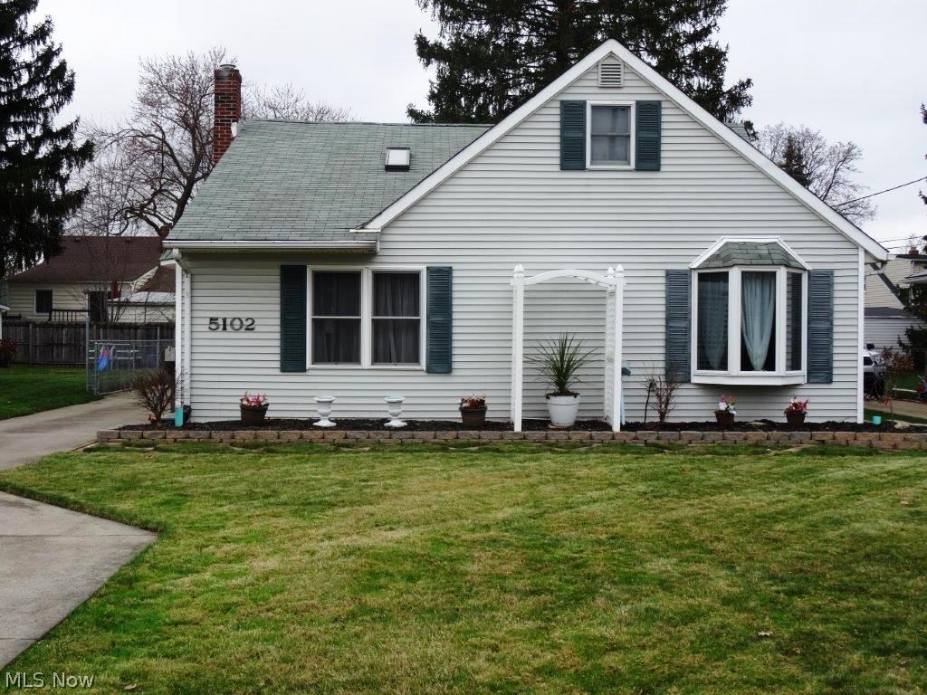 Hard to find spacious cape with 3 bedrooms, including master suite, 2 FULL bathrooms (one main floor, one in master on second floor), and an enormous 3 car garage heated and cooled, with walk-up storage space - could be workshop, or easily finished. You'll love the floor plan of this one, not your typical cape - large open living/dining room w/hardwood flooring, updated kitchen w/all appliances included, 2 first floor bedrooms w/hardwood flooring, and a first floor full bathroom. Upstairs you will find a full master suite, with private master bath - double vanity, tiled walk-in shower, and a bonus room that could be used as an office, nursery, or even more closet space! Full basement is neat and clean, nice laundry area, front loading washer/dryer are included! Anderson wood double-pane windows, vinyl siding, hot water tank 2011, central air 2011, roof 2009, remodeled master bath, updated landscaping. Nothing to do here but move in and enjoy - one year home warranty included! Fantasti