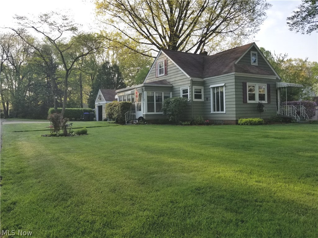 Charming Cape Cod. 3 Bedroom 2.5 bathroom...Master bedroom has half bath and 2 large closets... Lower level family room...Enclosed Porch...Fenced back yard...