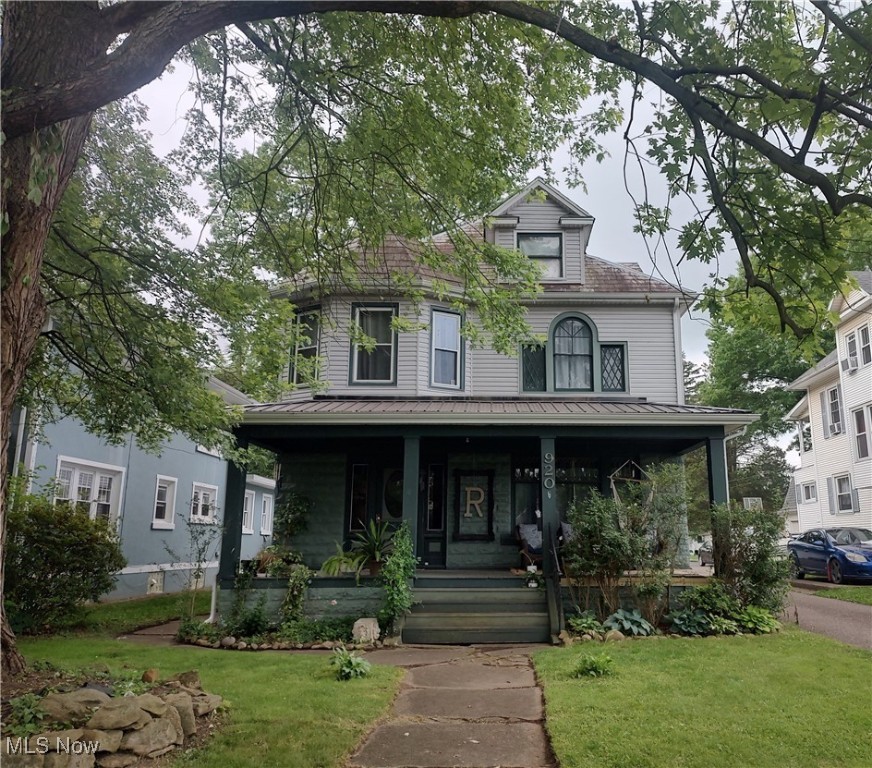 Beautiful Victorian built in 1910. So much character, hardwood flooring, pocket doors, lead glass windows. Updated kitchen with lots of cabinets. Formal dining room, living room, family room on main floor, Large foyer 10x10 foyer upstairs with 4 bedrooms. Property also has an attic that the owners are using as a 5th bedroom. (24x32) -3 car detached garage and enchanting back yard, and large back porch! Close to everything!