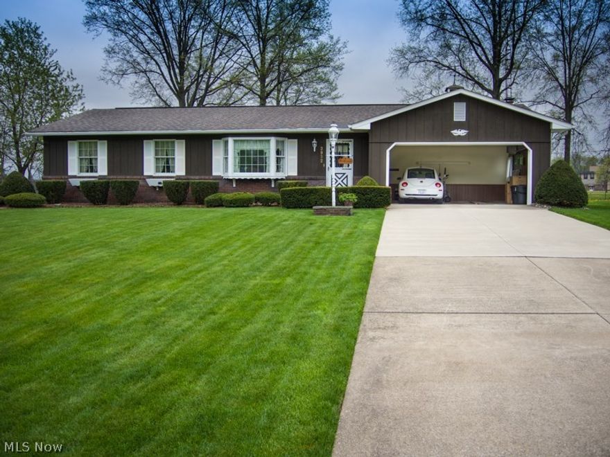 We just found this lovely ranch in Howland featuring 3 bedrooms, 3 baths, family room w/wet bar, fireplace, custom 3-tier mantel w/brick. Lovely kitchen w/newer appliances, eat-in area or eat-at bar w/large counter space for baking & cathedral ceiling. Huge pantry. Beautiful dining room w/cathedral ceiling & chair railing. The lovely living room has w/cathedral ceiling & bay front window. All three bedrooms have ceiling fans w/lights. Master bedroom has master bath. Full basement w/crawl space, pool table, washer, dryer & freezer, also a 10 x 13 room now used as sewing room, could be office/den and full bath. A beautiful 3 season sun room on back for your morning coffee or eat-in dinners. Hardwood floor in both baths. Doors are 6-paneled. 2-story shed in back.