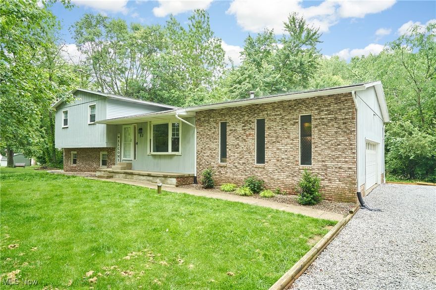 OPEN HOUSE JUNE 14th 12:00-1:30pm. Welcome to 53 Joel Dr in Mogadore! This beautifully updated home is packed with modern upgrades and thoughtful features throughout. The heart of the home is the renovated kitchen, complete with new granite countertops, reverse osmosis system, added cabinetry, and a cozy breakfast nook perfect for casual dining.

Enjoy peace of mind with major system upgrades including a new hot water tank, whole house filter, new water softener, new electric panel, and a new propane tank for heating. The upstairs bathroom has been remodeled, and a convenient laundry room was added to the layout.

Additional updates include new carpet, all new flooring, ceiling fans in every room, updated lighting fixtures, updated stairs, and a charming shiplap accent wall. Outside, you’ll find two new sliding glass doors, a new gravel driveway, a new side garage door, and even a hot/cold exterior faucet—perfect for cleaning or outdoor projects.

This home is truly move-in ready with quality improvements at every turn—schedule your showing today!