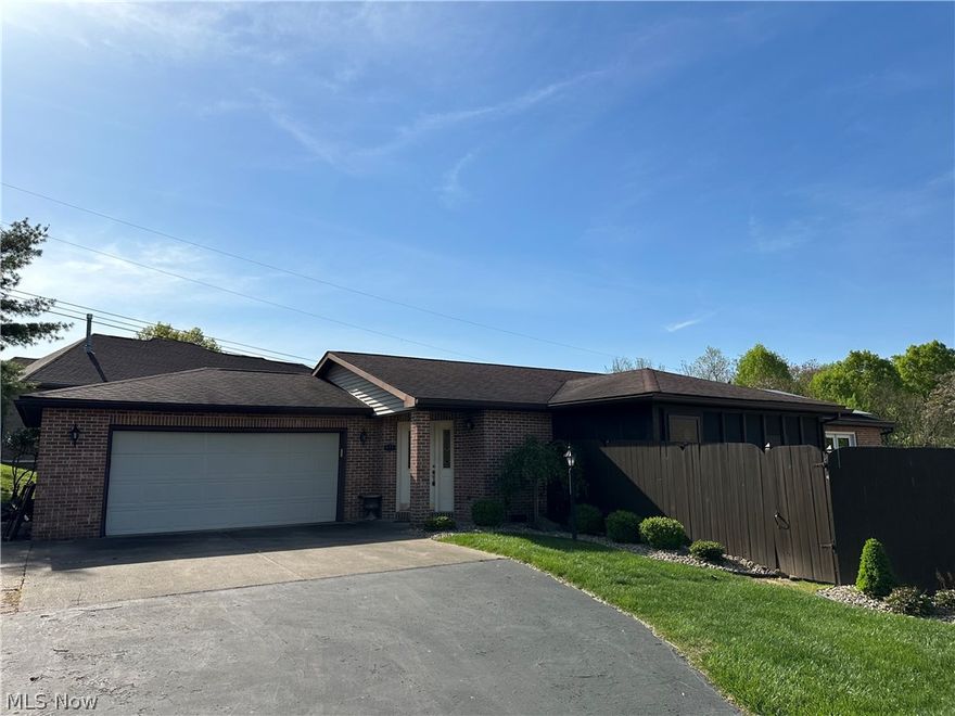 3 Bedroom patio home with full basement two full baths, both have been updated, Master bedroom has wonderful walk-in shower, walk-in closet, and opens to deck. Great room area has beautiful hardwood floors, built-in TV area, opens to full dining area, updated kitchen with granite counters, house has solar panels that provide for electric, bill is $5.00 a month, whole house Generac generator, side yard is enclosed and beautifully landscaped, privacy fenced, screened porch, deck with hot tub, complete privacy!