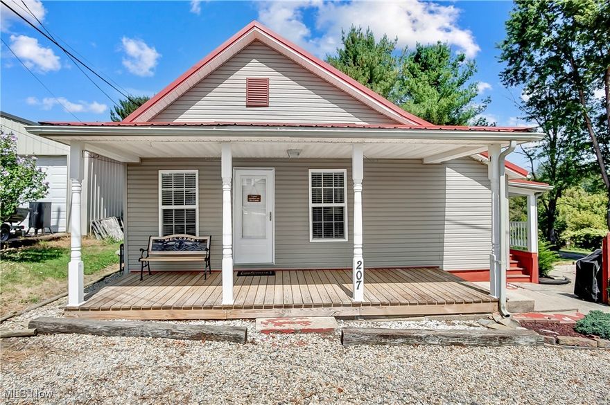 Charming 2-bedroom, 2-bath home located in the heart of Philo and the Franklin Local School District. Nestled on a corner lot with a spacious yard, it includes a detached 1-car garage and two storage sheds for extra space. Enjoy outdoor living on the covered front porch or the deck off the kitchen. Inside, the home features new interior paint throughout, first-floor laundry, and two bedrooms, each with its own full bathroom—choose your master! Perfect for a starter home or anyone looking to downsize to a one-floor ranch. A cozy, convenient, and low-maintenance option!