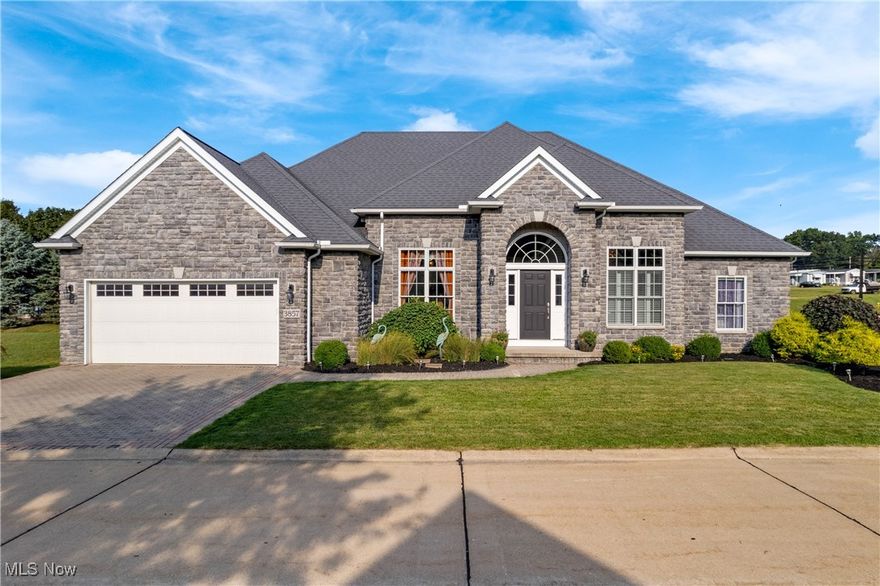 Beautiful one owner ranch home in Green with all the benefits of Main Chain of Portage Lakes access without the prices!! Short walk to boat slip and lake views on East Reservoir. Close to speed/ski and swim zones and just a quick boat ride or walk to bars and restaurants. Large open floor plan with 4 bedrooms on the main floor including first floor laundry. Possible 5th bedroom in finished basement. Separate dining room for entertaining. Front office off foyer with French doors and custom bookcases and desk. Kitchen offers a breakfast bar and top of the line LG stainless steel appliances. Sliders to the private back patio. Three bedrooms with full bath on one wing of the home. Master suite on separate side of home with walk-in closet, double vanity, tiled walkin shower and large tub. Transferable waterproofing Warrenty. Amazing lower level with enormous family room, stone wet bar, unique copper countertops, built-in ventless fireplace, Sonos sound system and your very own karaoke stage!! You will have the best parties! Full bath also in the lower level along with a second dishwasher and sink for easy clean up. Large playroom or additional bedroom for guests. 12 course basement. 200 amp wiring. High efficient furnace 2021. Two car attached garage. Fabulous corner lot in desirable Heron Watch development. Professionally landscaped including irrigation system. Homeowners association hand shovels your custom paver driveway and walkways! HOA also covers irrigation for common areas, retaining walls, sea wall, walkways, reserve fund, street lights, snow plow of community streets and electric and water for your boat dock. Better "almost-lake" than never!!