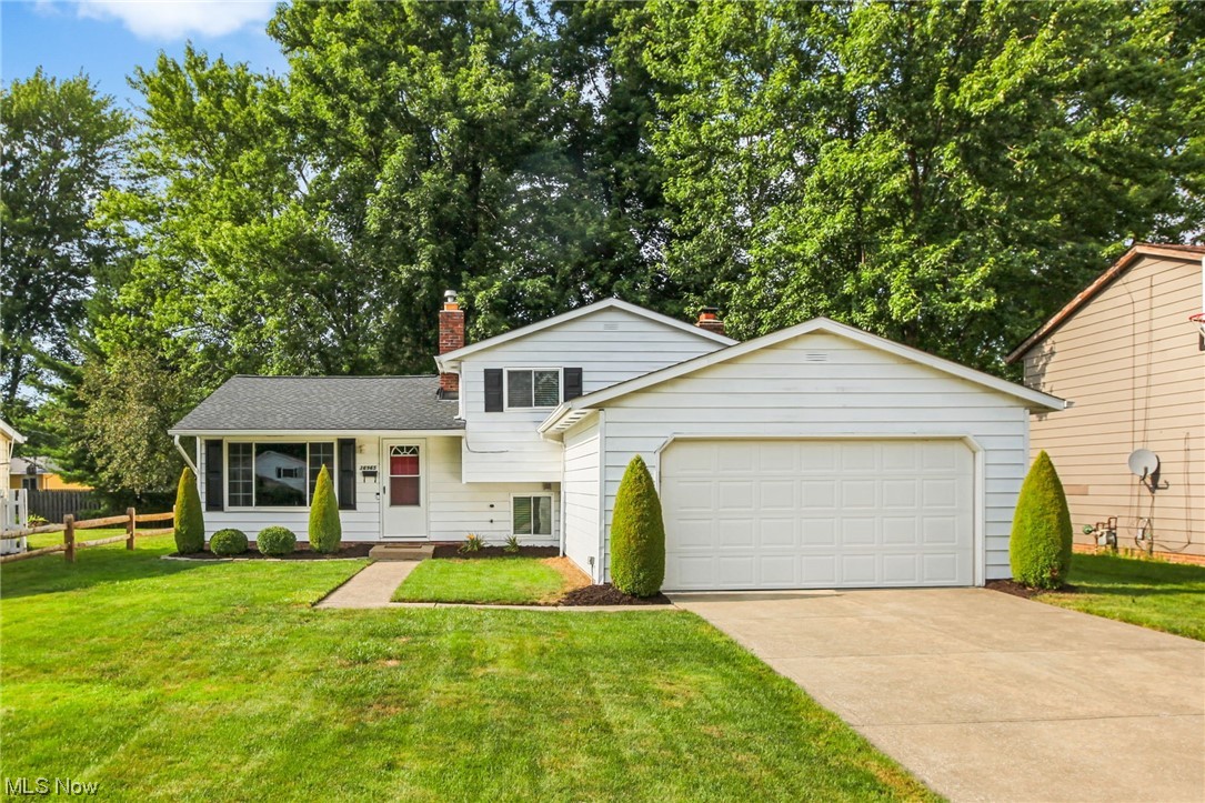 Welcome to this spacious and move-in ready home in Eastlake, located on a side street just minutes from Lake Erie, with fenced-in backyard, patio, and a shed. This home features 3 bedrooms and 2 full baths, an updated eat-in kitchen with granite countertops, all stainless steel appliances that are included, and a dining area with access to the patio, two living spaces including a lower-level family room with a fireplace, and an attached 2-car garage. The following improvements were made in recent years making the home in the condition it is today: Replaced roof (2018), installed luxury vinyl flooring in family room and laundry room (2021), installed a privacy fence in backyard (2021), replaced refrigerator and garbage disposal (2016), added recessed lighting in family room (2020), electric car charging port in garage (2019), Ring doorbell, ceiling fan in bedroom (2019), and exhaust fan in bathroom (2016), added a feature wall in one of the bedrooms (2022), reseeded the backyard (2022),