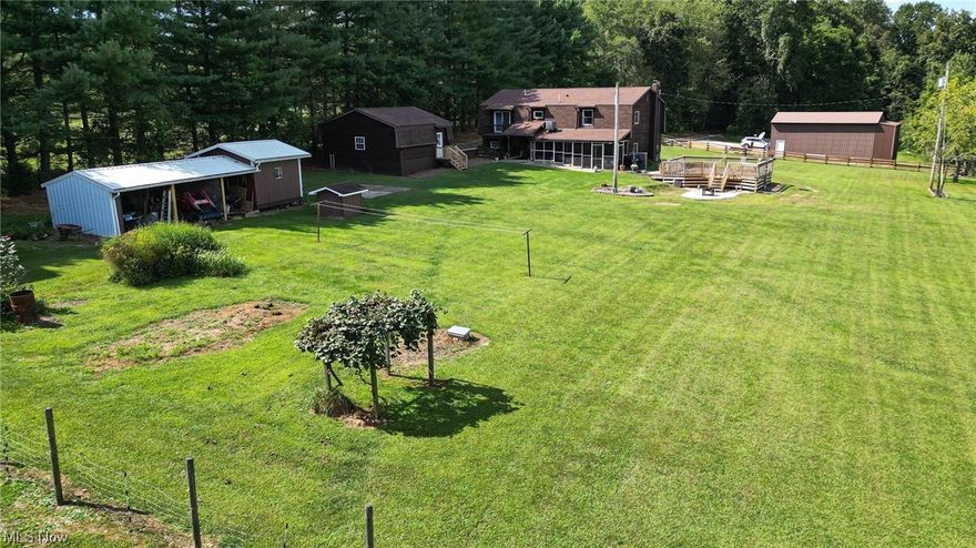 Beautiful Country Setting ..12.5 Acres ...1-Owner Built in 1988. This Unique Home features 4 Bedroom/ 2 full bathrooms/ 2-stories but you could live on 1
r/ Large galley Kitchen & Laundry Room on the Main Floor.. 2nd Floor features a very cool overlook into first Floor, a Master Bedroom, An Additional Bedroom, a bath, and large Family Area. This property has lots of outside areas including a 46'x 20' Garage that accommodates a motorhome. A 24'x32' Barn with horse stalls, a 12'x 35'storage shed & lean to for farm equipment, a 24'x24' Car Garage!  Property does have a fenced area for animals (owner used to have horses)... when you go through the woods to the back of the property. you have 200'+- of Little Kanawha River frontage. You can be the next Owner of this Mini Farm enjoying your morning coffee on the back porch watching the wildlife!