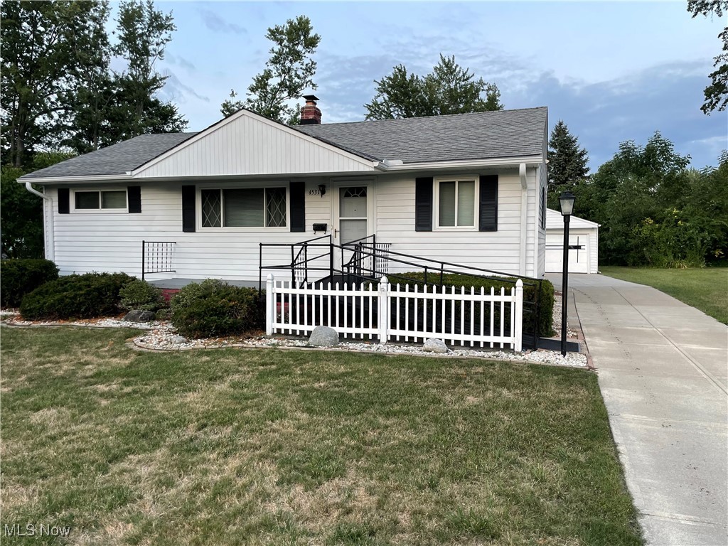 Perfect first floor living close to shopping and freeways. This home shows pride of ownership and has been meticulously taken care of.
Good size kitchen with plenty of counter space and cabinets. Nice living room dining room combination. First floor bath with updated walk-in shower. Lower level with cozy family room has a bar and room for guests. Extra room for office/bedroom. Basement also has a large full bath with shower. Large lot that is nicely landscaped and partially fenced. Large two car garage. Additional gravel parking spot for boat/RV/car.