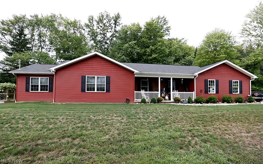 This beautiful 3 bedroom, 2 full bath ranch was built in 2015 and offers seclusion and privacy on almost 2.5 acres. This home has a 3 car attached garage and also a covered pad for extras. Hardwood casing and moldings finish each room with an open floor plan, first floor laundry facilities and a spacious unfinished basement. A great buy just inside the city limits.