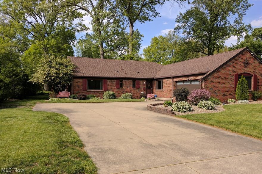 Very rare West Akron find - gorgeous all brick Kemple ranch with 3 large bedrooms, 2 full baths, 2 car garage and a basement! Fall in love with this stunning one story home that offers a true blend of style, character, and modern updates.  You will be wowed when you enter the bright foyer w/ceramic flooring, and opens to a huge great room featuring a vaulted ceiling and breathtaking picture window! Tons of room for entertaining with an ample sized formal dining room and fully applianced kitchen. Large master suite is complete with a full bathroom.  The main floor is completed with 2 spacious bedrooms, another updated full bathroom w/dual vanity, and a first floor laundry room - washer/dryer included! The partial basement is neat and clean as a pin! Outside you will love the beautiful landscaping. Major updates include: ALL new windows (2010-2012), new hot water heater (2012), new furnace (2013), new central air (2016), new flooring in great room, kitchen and dining rooms (2014-2016), n