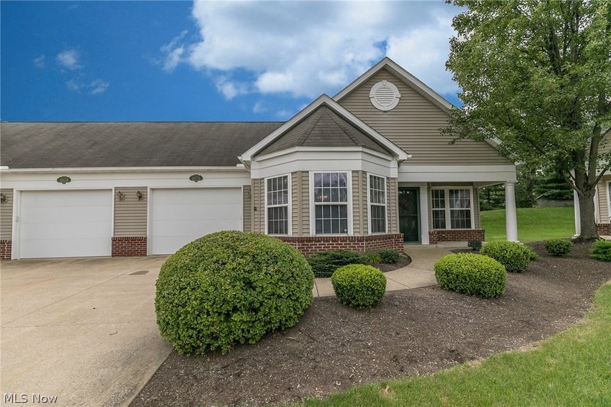 Easy one floor living in this ranch cluster home! Large and open eat-in kitchen with plenty of cabinet and counter space, all appliances included. Spacious master bedroom with walk-in closet and master bath. Neutral decor throughout home. Attached garage with tons of attic storage space. Covered front porch and private back patio. Handicapped accessible with wide doorways and hallways. Very well-maintained 55+ community with many amenities, including a beautiful private lake, playground, meeting and exercise rooms and a wide selection of events and activities for its residents. Don't miss out on this opportunity!