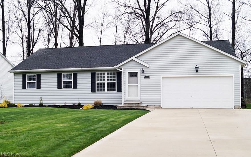 Modern and updated ranch home on a fantastic street in Avon!  Walnut laminate floors lead though the vaulted open floor plan that has been enhanced with numerous upgrades including: an eat in kitchen and dining room with walk in pantry, granite counters, glass subway tile back splash, & stylish black appliances that stay!  A cool neutral color palette flows through the family room anchored by a stacked stone, floor to ceiling fireplace!  Continue the entertaining through sliding doors to the sun- filled 3 season room & grill on the patio!  Just off the living room, find two bedrooms that share a freshly updated & bright, full bath.  Master bedroom with large closet and another updated full bath! All bedroom doors have been upgraded to frosted panel doors.  There is a full, unfinished basement with laundry that offers tons of storage and awaits your finishing  touches!   All appliances included. Two car attached garage w/ new opener!  New shed for additional storage.  One year home warr