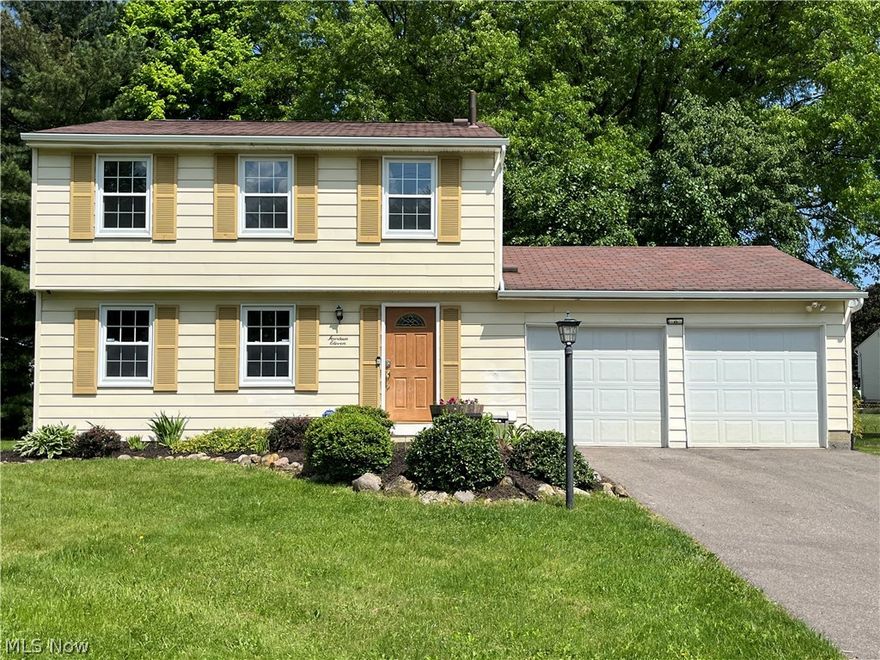 Visit this newly updated 3 bedroom Colonial home located in Copley.  You will be greeted by a large driveway and two car garage with EV charging station. Upon entry, you will be welcomed to the main level featuring spacious Living and formal Dining Rooms with French doors leading to fenced backyard with a split level deck great for entertaining and personal enjoyment.  The Kitchen flows into the Dining area and features new butcher block counter tops and newer appliances (2021) and new flooring (2022). The 2nd floor features 3 well sized Bedrooms complete with new flooring (2024) and a full bath.  The large Master Bedroom features a walk in closet.  Basement has a great Recreational Room and an Office/Play area with ceramic tile and Laundry.  Complete interior of the home is freshly painted (2024).  Furnace (2011), Water tank (2013), roof (2006).  Copley-Fairlawn School District, conveniently located to parks, shopping and entertainment.  Move in ready. Enjoy this fabulous home.