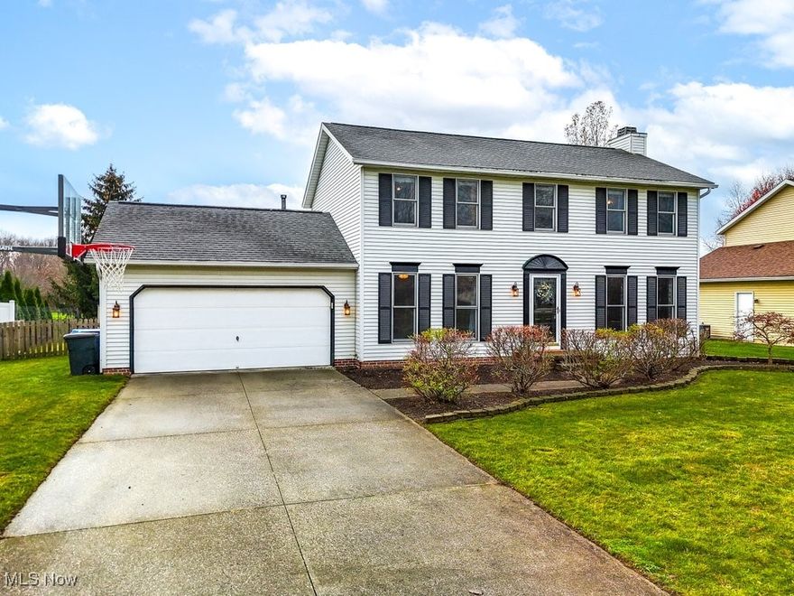 Start 2025 off right in your New home! This attractive and well-maintained center hall colonial in the desirable Fieldstone neighborhood of Kent is ready for its next chapter with the new owner! The main level features a bright and spacious great room with gas fireplace, a formal dining room (currently used as an office). The eat-in kitchen features Stainless steel appliances and a large bay window overlooking the backyard. A convenient half bath and durable laminate flooring (installed in 2022), and neutral paint make this space both stylish and practical. Upstairs, the primary suite provides a relaxing retreat with vaulted ceilings, walk-in closet, and an en suite bath with walk-in shower. Three nicely sized additional bedrooms and a second full bath offer ample space for family or guests.
The full basement provides abundant storage and potential for additional living space as well as a washer and dryer that stay with the house and a radon mitigation system for added peace of mind. Off the kitchen is a slider door that exits to a large deck overlooking a flat, fully fenced yard perfect for your four-legged friends or for entertaining. The home also includes an attached two-car garage and shed for added convenience and storage. Recent updates include a radon system (2019), roof (2012), furnace (2022), water heater (2019), washer/dryer (2021), and dishwasher (2023). The original A/C (1997) is still in great working condition, and the Sellers are offering a one-year Home Warranty to the new owner. With its conveniently location near downtown Kent, Kent State University, Stow shopping, and Route 8, this move-in ready home offers a great value with comfort, style, and convenience. Start the New Year in your new home! Come see today!