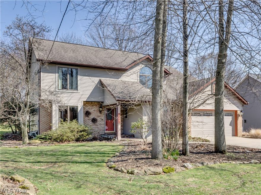 Priced to sell!!! Recently reduced $25,000. One-owner home where attention to detail is evident through-out. Welcoming front entry with paver stone walkway & porch.  Upon entering in the distinctive 2-story foyer and beautiful angled staircase you will be delighted to find formal living rm, formal dining rm highlighting  hardwood floor, Wainscoting and chair rail. The wood burning frpl with gas starter warms the sunken family rm featuring dramatic paneled wall treatment and built-in shelving. Gourmet kit with granite counter tops, center island with bar sink, built-in induction cook-top and double ovens. Triple window at main sink overlooking lush backyard, breakfast rm w/extended glass front cabinetry & wrap around bay window alcove.  Powder rm with beadboard paneling and ceramic flrs, first flr laundry rm. Wonderful screened back porch offers views of the large treed lot with expansive perennial gardens, paved patio, shed, small pond/water feature and professionally landscaped. 2nd f