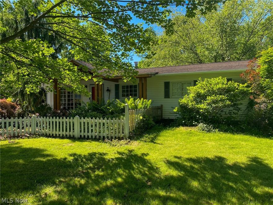 Absolutely stunning 3 bedroom ranch located on a dead end street in Aurora with new flooring throughout! Enter through the front door to be amazed at a large, open flowing layout! Beautifully stoned fireplace, large living area extends to an oversized kitchen and large family great room! Mud room and laundry room off garage with ample storage space. 3 bedrooms and 2 full baths complete the main living area. Out back, you will be greeted by a private oasis! Large deck overlooking a beautifully placed waterfall, and private setting. Large outbuilding/barn complete anyone’s needs in a home. Call today to schedule your private showing before this one too is sold!