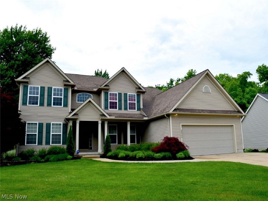 This beautiful, custom built, 4BR 3.5B colonial is a must see. The 4,845 SF home (basement included) was constructed by Sturgess Construction in 2006. The front entrance provides a view of natural woodwork seen throughout the home. The hardwood floor in the foyer leads to the living room, which boasts two stories of windows and a see-through fireplace that shows the private office. The office continues to a private deck facing the wooded backyard. The kitchen includes ceramic countertops, plenty of cabinets, a walk-in pantry, and an island. The sunroom has a mosaic design and skylights that lead to the patio that connects to the deck. The patio includes a 220-volt line and can accommodate a hot tub. The stairs merge from the foyer and living rooms. Upstairs holds the four bedrooms, including a master bedroom, and a separated bathroom. The hallway upstairs between bedrooms overlooks the high ceiling living room and windows and has a lovely view of the wooded backyard. The master bedroom