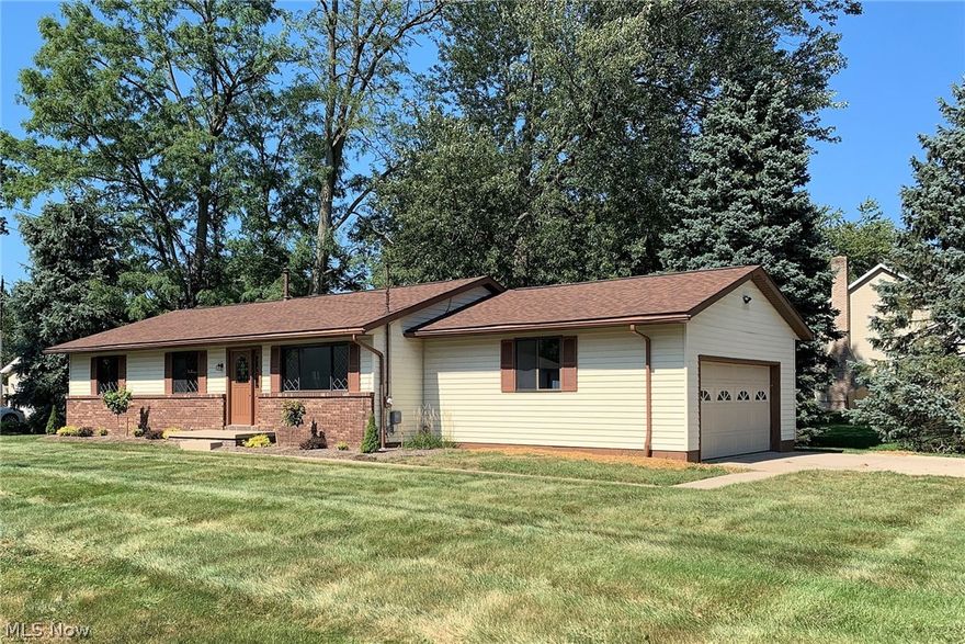 Move right in to this fully renovated four-bedroom, two-full bath ranch, in Munroe Falls! Over 2,000 square foot of finished living space offers many options! The main floor hosts three bedrooms, an updated full bathroom, all new eat-in kitchen with lots of cabinet space, stainless steel dishwasher and microwave, and a built-in desk area, a family room and a bonus room off the kitchen (could be an oversized pantry, mud room, or converted to first floor laundry). The basement is fantastic offering a fourth bedroom w/ a full egress window, a recreation room, a full bathroom, laundry and a large bonus storage room. Two car attached garage. Back deck off the kitchen. Paved two-car wide driveway. Many updates including a new roof in 2017. Public water & sewer. Stow Munroe Falls schools. A quick jaunt to Munroe Falls Metro Park and Waterworks park. This is a great home in a wonderful location! Schedule your viewing today!