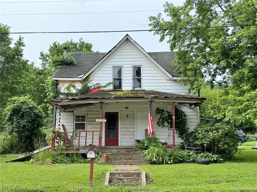 Investor’s dream! This charming home sits on three parcels and offers endless potential for the right buyer. Featuring spacious rooms, original hardwood floors, and a convenient first-floor bedroom and laundry, this property is ideal for those looking to renovate and add value. The layout is functional with plenty of room to reimagine or update to fit your vision. Whether you’re planning to live in it, rent it out, or resell for profit, the opportunity here is undeniable. The generous yard provides outdoor space for recreation, gardening, or potential expansion, and the detached 1-car garage adds practical storage. Located in a quiet neighborhood, this property is ready for transformation. Cash buyers only. Sold as-is. Bring your vision and unlock the possibilities!