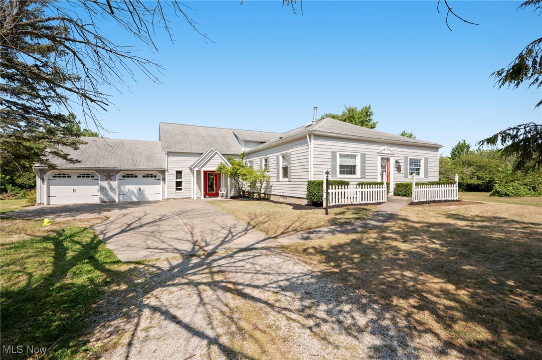 Charming & thoughtfully updated century home set on 4.25 acres in Leroy Township in the Riverside School District. Surrounded by a blend of open yard space & wooded views, this inviting property offers the perfect balance of privacy & outdoor enjoyment. The home features exposed beams, rich wood accents & architectural character, creating a warm, timeless feel throughout the 2,638+ sq ft of living space. A remodeled kitchen has a beamed ceiling, leathered granite countertops, stainless steel appliances including a double-oven range, a breakfast bar, and is open to a dining area w/ wood wainscoting. A spectacular 2-story great room addition showcases a floor-to-ceiling stone fireplace & provides access to a large covered back porch spanning nearly the entire rear of the home. The owner’s suite is set apart from the additional bedrooms & includes an en-suite bath. Flexible living space offers 3 bedrooms plus an additional room ideal for a home office or 4th bedroom. A cozy living room w/ hardwood floors & a mud room featuring a library-style ladder to a 2nd-floor loft overlooking the great room add to the home’s unique charm. Additional highlights include an attached 2-car garage, shed, and plenty of open land for recreation, gardening, or enjoying the peaceful surroundings. Recent updates include: partial roof replacement (2023), remodeled kitchen & 1st-floor bath including updated electrical, plumbing & flooring (2024), replaced well pressure tank & added filtration (2022), replaced dryer (2025), dishwasher & stove (2024), refrigerator (2018), added a window in great room (2024), replaced flooring in great room, master bedroom, laundry room (2021), loft & stairway carpet (2025), replaced fireplace gas insert (2023), and much more. A detailed list of update is available upon request. INCLUDED are ALL kitchen appliances, washer/dryer & a 1-year home warranty. Located near I-90, OH-44, parks, shopping, restaurants & other local attractions.