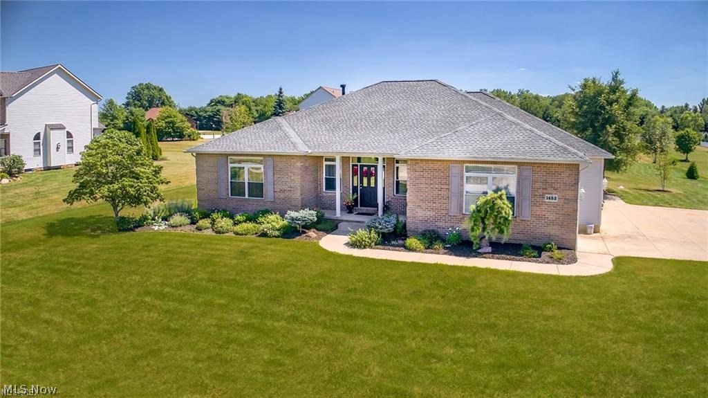 Looking for 1 floor living? This is it! "Rarely available Ranch" and "Gorgeous" describe this awesome property in the hidden gem community of Portage Commons Development. Open floor plan! Spacious great room with built in's and gas fireplace. The foyer features a Carrera marble floor, which coordinates perfectly with the fireplace. The bright and newly updated kitchen include cabinets, quartz counter tops, KitchenAid stainless steel appliances, marble back splash, under cabinet lighting and large pantry. French doors will lead you from the kitchen/eating area to a large all season beautiful sunroom with lots of windows. Master suite offers walk in closet and full bath featuring a full size shower, large soaking tub and double sinks. The 2nd full bath features Turkish marble floors, a new vanity with marble countertop and custom tile in the oversize bathtub. First floor laundry room has a full size laundry sink and cabinetry for additional storage. Enjoy the flat backyard an