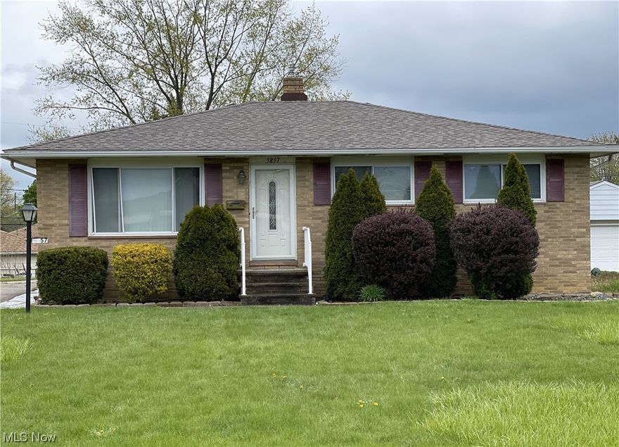 Beautiful three bedroom brick ranch on a quiet, well maintained street. Large living room with picture window. Kitchen is also nice and bright and comes with appliances.  Hardwood floors in some rooms. Very clean full basement with newer furnace, a/c, electric box and hot water tank. Roof is under a year old. Nice sized yard and 2 car garage.