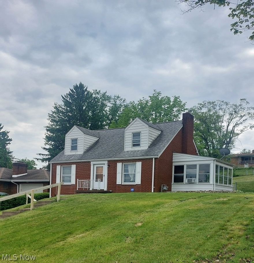 Charming 1.5-story brick Cape Cod home featuring 3 bedrooms and 2 full baths in desirable Spahn’s 3rd Addition — one of Steubenville’s finest neighborhoods. This well-maintained home offers an enclosed side porch just off the living room, perfect for relaxing year-round. Enjoy the fenced rear yard complete with a spacious 10x16 wooden deck, ideal for entertaining or outdoor gatherings. Additional features include a 1-car garage and a convenient central location close to shopping, schools, and amenities. Call today to schedule your private showing!