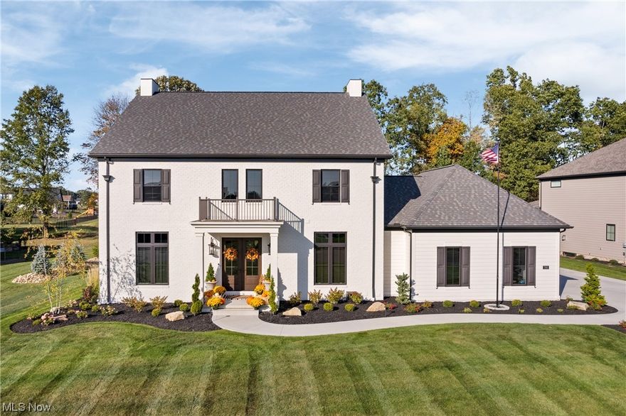 Exquisite custom built Memmer home in the desirable Berkshire Farms neighborhood in the heart of Jackson Twp. This gorgeous property offers a 4 car garage, 4 bedrooms, 4.5 bathrooms, and over 5000 square feet of living space. Built in 2021, the home is immaculate. This stately property has an open floorplan perfect for entertaining with 10 foot ceilings on the main level and 9 foot ceilings on the second floor. As you enter the double front doors a large foyer welcomes you and your guests. The study/den is located just off the foyer through glass french doors and has a large window allowing for an abundance of natural light. The great room has a custom fireplace, hardwood floors, and breathtaking views of the professionally landscaped private backyard. The well appointed kitchen has custom Amish cabinetry, an large island, professional appliances, a butlers pantry and dry pantry. The dining room offers the perfect setting for family dinners and has access to the stamped patio and outdoor fireplace for those cool fall evenings. The upper level is home to the primary suite and primary bath with custom tile shower, large walk-in closet and three additional large bedrooms. The lower level is finished and is the perfect spot to watch the game of have family movie night. There is an additional full bath and bedroom in the lower level as well. This is a rare find in Berkshire Farms and will not last long. Schedule your private showing today.