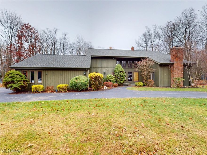 You will love this 4-bedroom, 3-bath home, perfectly nestled on a breathtaking 2.85-acre cul-de-sac lot in one of Willoughby Hills’ most scenic settings. A convenient circular driveway leads you to a secluded retreat with parklike views and natural beauty in every season—offering a peaceful, country-like ambiance just minutes from everyday conveniences.

Inside, this spacious colonial welcomes you with a dramatic two-story foyer and a floor plan that blends functionality with classic charm. The first floor features a large home office, a formal dining room, and a generous great room with a functional fireplace—ideal for both gatherings and cozy evenings in. The eat-in kitchen is designed for everyday living and entertaining, showcasing ample cabinetry, a center island, and direct access to a deck that leads to the fabulous inground pool.

Upstairs, you’ll find four well-appointed bedrooms, including a comfortable primary suite, plus plenty of storage throughout. Additional conveniences include a first-floor laundry room, attached 2 car garage and a spacious lower level, completely finished,—perfect for additional entertaining space and all of your home organization needs.

The outdoors truly feels like your own private oasis and the inground pool surrounded by serene wooded views, creates the perfect backdrop for summer relaxation and entertaining.

Located just minutes from parks, top-rated schools, shopping, dining, and quick highway access via I-271 and 90, this property offers the ideal blend of privacy, beauty, and convenience. Homes like this are rare—don’t miss your chance to make this one-of-a-kind retreat yours. Schedule your private showing today!