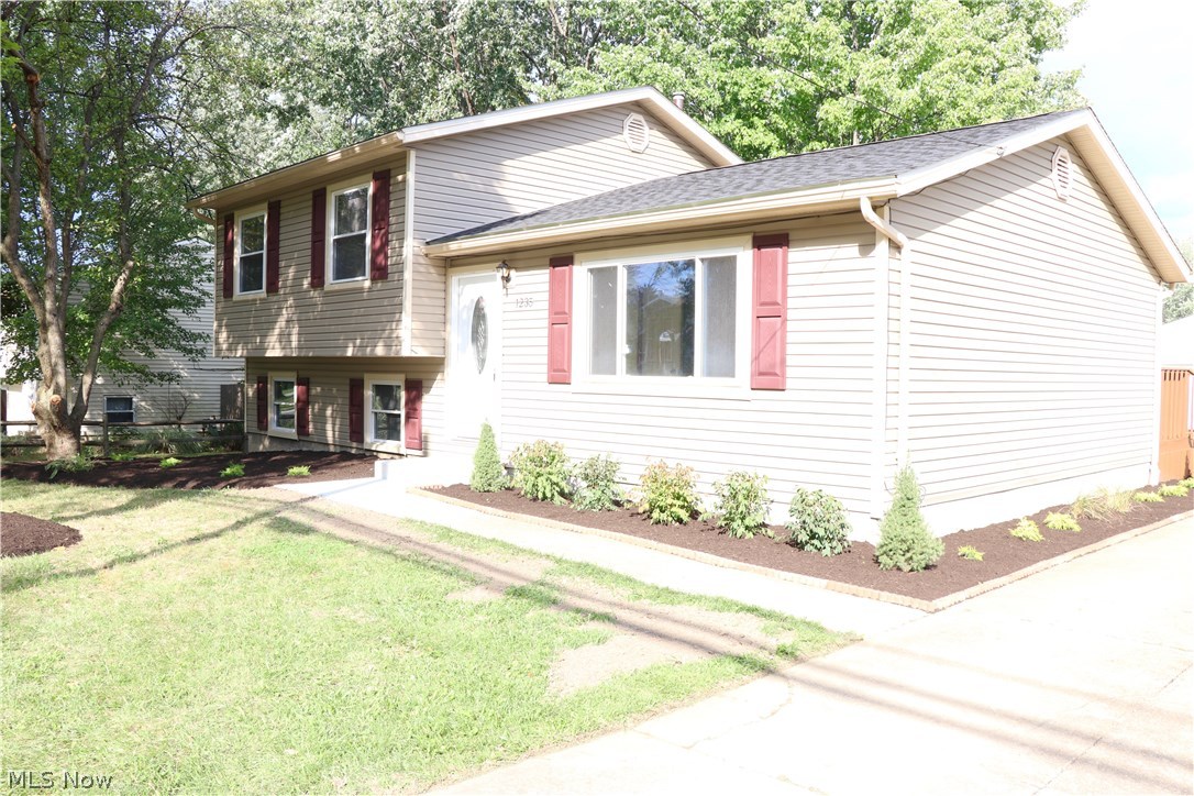 Great home in the Copley school district! This 3 bedroom split level has eye catching curb appeal and a wonderful back yard and deck. The living room has a tiled entry area with a coat closet. It opens up into the dining area where there is access to the deck. The kitchen and dining area are nice and open for entertaining. New stainless range and dishwasher, newer laminate floors and oak cabinetry. On the second level you will find all three bedrooms and full bath. The renovated bathroom has tile floors, tile tub surround and a jacuzzi tub. On the lower level is the bonus room. Perfect as a family room, office or man cave. This level also has a walk-out to the back yard. Brand new carpet in the living room, family room, hall and bedrooms. Newer windows, roof and furnace. Deck was just stained. Large 2.5 car garage is brightly lit with shop lights and all the storage you need. Schedule your showing now!!