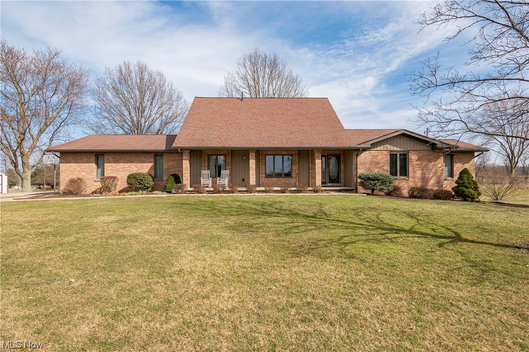 Welcome home to 8329 Coal Bank Road! Don't miss this brick home sitting on a beautiful 3 acre lot boasting 4 bedrooms, 3.5 bathrooms, and 2,200 sq ft. Find your culinary inspiration in this spacious kitchen featuring new LVT flooring, maple cabinetry and newer stainless steel appliances. Sip your morning coffee in your sun-filled eating area or just outside on the new deck. Right off the kitchen is your formal dining room and first floor laundry room with a half bath. You will love the main level owner's suite which features a large walk-in closet, jetted tub, shower, and extended sink. The garage and kitchen both grant access to the basement. An oversized rec room offers luxury vinyl plank flooring, a propane fireplace, and connected kitchen. The 28x32 barn/detached garage has water/electric, 1 car space, plenty of storage, and a loft. Enjoy the sunsets on your front porch surrounded by serene country views. New water softener system, HWT, well pump, & well tank all in the last two ye