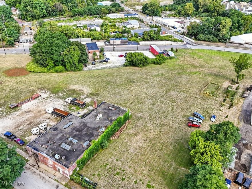 Great opportunity to own 4 acres zoned Industrial - endless possibilities.  On one of the 8 parcels that are included is an older warehouse with over 6000 square feet.   NW portion of properties zoned U4 Commercial and SE of properties is zoned U6 heavy industry.