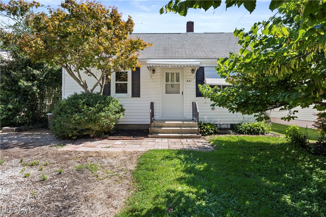 Awesome ranch in Elberta Beach, within walking distance to Lake Erie! Perfect vacation or year-round home. Family owned and built in 1948. Well built, with pristine hardwood floors throughout. White vinyl siding. Fenced yard. Enclosed patio addition. Brick paver patio in the backyard. Cute kitchen with new stainless sink and faucet, and black appliances that stay. Whirlpool refrigerator with lower freezer drawer for convenience. GE Adora gas stove with center griddle and convection oven. Large 15x11.5 Living room with hardwood floors under the temporary floor covering. Updated bathroom with new vanity and granite countertop, and ceramic tile shower surround. Updated vinyl, double-hung windows. Hi-efficiency gas furnace. New hot water tank. Partially finished attic with pull-down staircase, could be an extra sleeping area or storage. Stay for the summertime or stay year round. This is a well built home for all seasons. Close to shopping, downtown Vermilion, beaches and marinas.