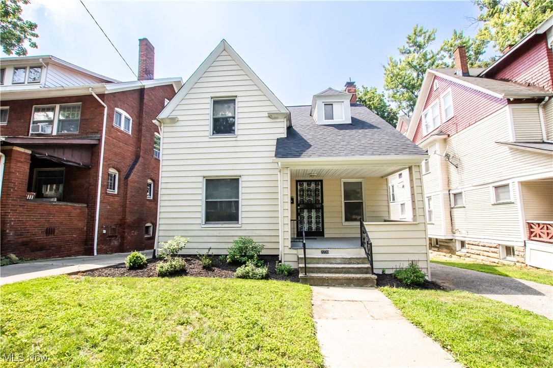 2220 Grandview Avenue in Cleveland Heights puts you at the heart of it all! Amazing value can be found here whether you are looking to own or invest! Come see this turnkey renovation in one of Cleveland Heights' most coveted neighborhoods, just steps from the dining and cafés in the Cedar Fairmount business district and a short drive to University Circle, and even downtown Cleveland. You'll fall in love with this tree-lined, historic street - not to mention the house itself. With an enchanting curb appeal that includes fresh landscaping and a picturesque front porch, you'll make your way inside to the foyer where you'll be met with LVP flooring and a remote-operated electric fireplace to welcome guests! You'll love the vinyl windows, beautiful woodwork, and crown molding that adorn this first floor. Wrap your way through the family room and dining room to the kitchen, and notice the newer ceiling fans and light fixtures as you go. The kitchen itself boasts recessed lighting, new cabinetry, and subway tile backsplash. All appliances stay! And don't forget to pop into the newly-remodeled first floor half bath - a must for modern living! Upstairs you'll find new carpeting in the hallway and in the 3 bedrooms, and you'll be wowed by the updated full bath with newer shower, vanity, flooring, and creative storage options that stay with the home! The classic Cleveland Heights basement (that features walk-out access to the rear yard!) has been cleaned, painted, and sealed, and a utility full-bath has been added as well. Your laundry area is found in this space too! But that's not all. Head back outside to take in a new garage that was built in 2024! The current space near the garage has been used as overflow parking, but this can be the perfect place for a dream patio too, with plenty of yard leftover at the back of the property! Other home updates include newer electrical and a roof less than ten years old! Don't miss this Cleveland Heights gem!