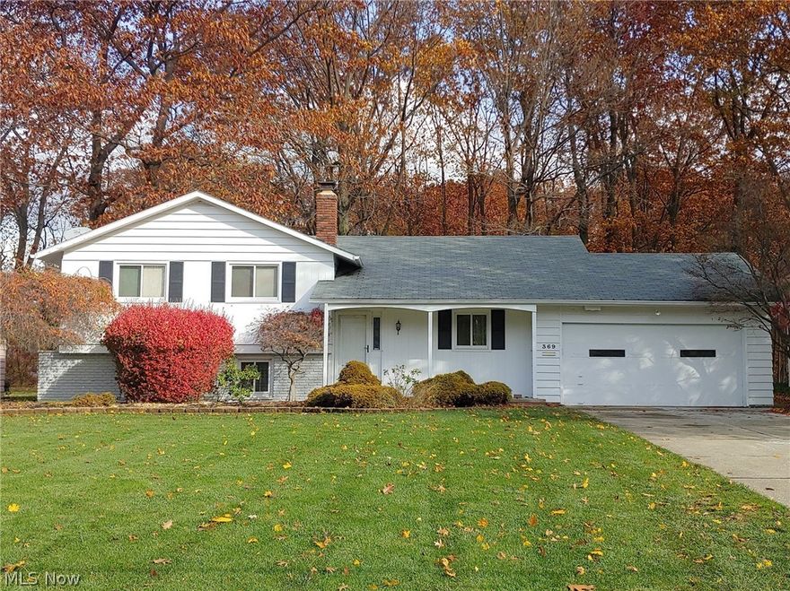 Spectacular split-level in the Scottish Highlands subdivision of Richmond Heights! This beautiful 3 bedroom, 2.5 bath home sits on a wooded lot with gorgeous ravine views.  Relax in the spacious living room and enjoy the eat-in kitchen with Corian countertops. The upper level boasts real wood flooring throughout the bedrooms and hall, and the master suite has its own private full bath. Off the lower level is a 12x9 room that could be used as a 4th bedroom or home office. 2 car attached garage, vinyl windows 2015, central air 2018, driveway apron 2021, roof in 2010 and a 1 year home warranty! Schedule your showing today!!