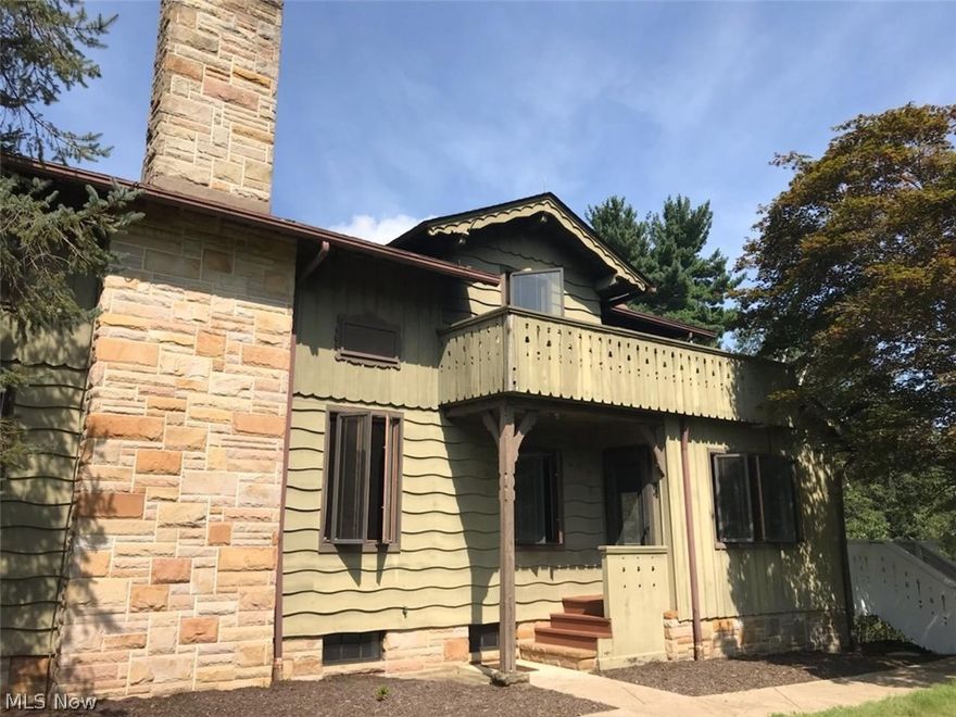 This Granger Township property has incredible charm and unique detail and sits on one of the higher points in Medina County. It is steeped in history being built in 1938 with many stories to tell! Enjoy the great views of Giant boulders, ravine with a stream, woods and a gazebo with a fireplace all on the properties 3.45 acres. Property is in the process of being surveyed and recorded with the county. This home was from a person of Austrian heritage who did most of the wood carving and tree plantings themselves. Many of the trees are from European countries. This home has two working fireplaces, stained glass windows and doors, wood ceiling, hand carved wooden sculpture over the fireplace and other hand carvings throughout the house. Each nail throughout the house was hand made as well as all door hardware and handles. All doors are thick, solid wood.  Home has hardwood and ceramic floors throughout. Home has a large deck that wraps around the home on two sides with great views and pri