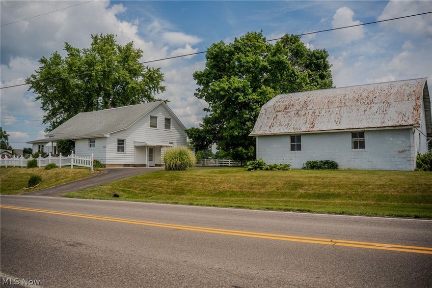 Combination of parcels 1-3. Check out this rare opportunity to purchase a great property in the heart of Holmes County! Whether you’re looking for a solid home with a barn and garage or a spot to build your own home or commercial building, this is the property for you. The main floor of the home features an oak Mullet kitchen, dining room with built-ins, living room and office/library as well as a bedroom and full bath with laundry. The upstairs contains 3 bedrooms, a half bath and an office area. The home also provides an in-law suite giving ideal living space for extended family or guests. With your choice of parcels 1-3 or any combination of the three, the options are limitless. You’re not going to want to miss out on this prime property.