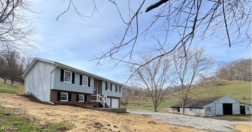 Escape to your own private retreat with this beautifully remodeled country home, nestled on 5 peaceful acres of land in the Indian Valley school district. This home has been tastefully remodeled with 3 bedrooms, 2 full baths, a finished lower level, a 2-car attached garage, and a 42x40 barn. Step inside to discover an open concept living space, a gorgeous kitchen with a center island, and a dining room with patio doors out to a new private back deck. Every detail has been thoughtfully designed to provide a cozy yet elegant atmosphere. Outside, you’ll find a spacious barn with 2 stalls, perfect for livestock, horses, or extra storage. There is also a stream that runs through the front of the property as a water feature. The acreage offers endless possibilities, whether you dream of starting a hobby farm, gardening, or simply enjoying the tranquility of country life. If you’re looking for privacy, modern updates, and room to roam, this is the perfect place to call home! Immediate possession is available.