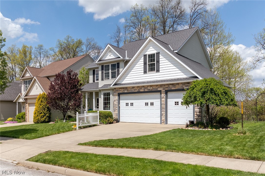 Beautiful 4 Bedroom Colonial available July 2024! Located in the Hudson City School District with the bus stop just yards from the driveway. This home boasts hardwood floors throughout the foyer and eat-in kitchen. Kitchen includes beautiful granite countertops with a center island and stainless steel appliances. The open floor plan includes a family room with corner fireplace.The formal dining room and half bath complete the first floor. As you walk up the stairs, you are greeted by the primary bedroom on the left and a cozy reading nook to your right. The primary bedroom features a large walk in closet, full bath with Jacuzzi tub and standing shower. Double sinks with granite countertops complete the room. Three additional bedrooms, an additional full bath and second floor laundry finish this floor. Full finished basement for additional entertainment plus a half bath. This home includes a large 3 car garage and a brick paver patio in the backyard. Schedule your showing today!