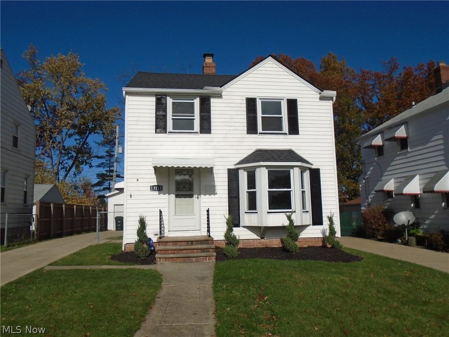 Beautifully updated colonial in great area of Garfield Hts!  Many updates within the past couple years include new kitchen with new stainless steel appliances, refinished hardwood floors, windows, full bath with tiled shower/bath & glass doors, finished recreation room and full bath in lower level, furnace & AC, and much more! Enjoy morning coffee or summer picnics on the back deck.  Large back yard to play or entertain behind the newer over-sized two car garage.  So much more!  Welcome Home!