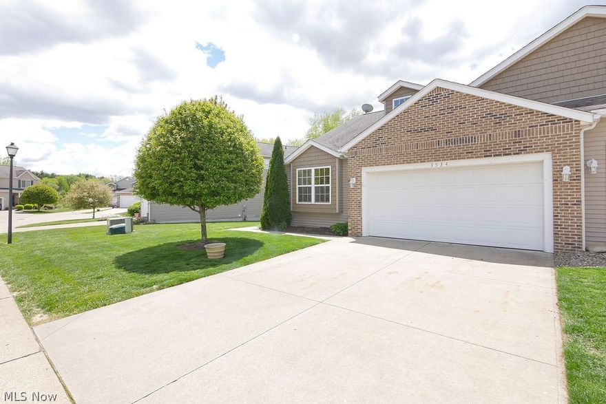 Wow!  Come enjoy maintenance free lifestyle in Uniontown.  Overlooking the 5th Fairway of Prestwick Country Club, you will love the tranquility of golf course living.  This condo offers first floor laundry, vaulted ceilings, a first floor master with en suite bath and walk in closet, a finished basement with ample storage and a wet bar.  The kitchen is open and airy with a breakfast bar, dinette, and bay and the open layout creates a spacious feel.  This condo also features a stair lift, accessible tub, and a loft that would be a great office or guest room.  Outside, the lower level walks out to a patio shaded by a large deck with retractable awning.  Schedule your showing today - this one will go fast!