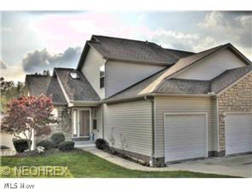 Beautiful contemporary condo with open floor plan. Well appointed kitchen with cherry cabinets, granite counter tops, breakfast bar, a double-oven range, built in microwave, dishwasher and refrigerator. The kitchen opens to the dining area and expansive great room which features a vaulted ceiling and sliding doors to the deck. 1st floor master suite with private bath. 1st floor laundry room with storage shelving. 2 additional bedrooms connected by a full bath can be found upstairs. Finished walk-out lower level.