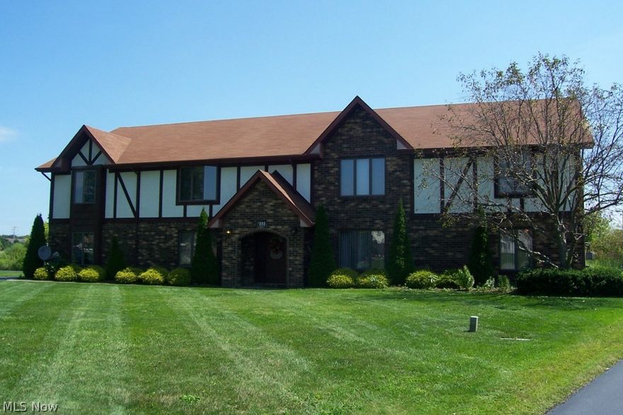 Easy access to this one story first floor condo in great Boardman neighborhood known for it's proximity to shopping, banking and restaurants.  This beautiful all brick Tudor style condo features CENTRAL AIR! Improvements in unit #1 in last four years include new furnace, new hot water tank, new ceramic tile through foyer, hall, kitchen and baths, new tiled shower and commode in main bath and new tile in master half bath.  All appliances including washer and dryer stay!  Low monthly maintenance fee for a stress free lifestyle!  Plenty of available parking in back for guests and additional storage space in garage.