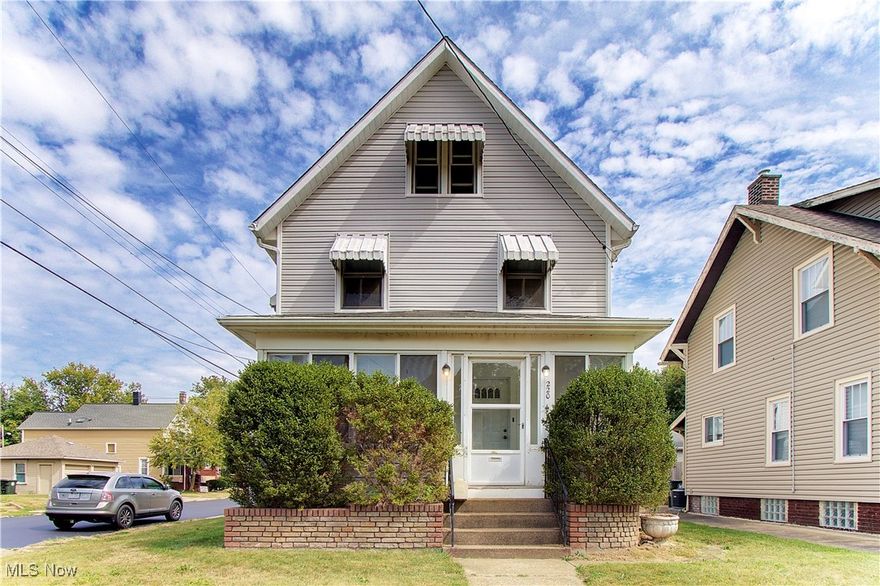 **HEATED 5 CAR GARAGE**  Leaf springs and tires and bearings!! Oh my!!  If these words are part of your regular vocabulary, this may just be the place for you?  2 car attached garage with heat, door opener, workbench and compressor.  Finished area between the house and garage offers gobs of space for added storage.  But wait, there's more.  Second lot offers a 3 car detached garage with door opener, finished walls/ceiling, glass block windows and virtually perfect concrete floors.  These two great garages are certain to have you saying, "awwwww, there's no place like home".  Step into the house with original thick rich beautiful baseboards, fantastic wood columns, pretty pocket doors, wowing wood staircase and to die for door hardware.  Enclosed front porch is the perfect place to relax and getaway from all the "wicked witches" of the world.  Second level consists of of 3 bedrooms(one doesn't have a closet), full bathroom and access to the attic.  Basement has workbench number 2 and plenty of space for all your storage needs.  Storage shelves are plentiful and are gifts to you.  Better click those Red Wings together, grab your favorite realtor and tell them "we're off to see the garages, the wonderful garages of Broad"............;)