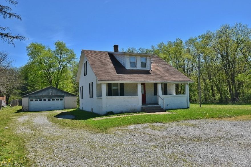 Really great opportunity for an investor or a handy man wanting a project home and priced right. This home was previously a 3 bedroom, 1 bath home but has since been converted into a duplex with a 1 bedroom unit on the ground floor and a 1 bedroom unit on the upper floor in addition to a full basement. Could easily be converted back into a single family home by adding a staircase back in which would make it a 3 bedroom, 2 bath single family home. Nice large covered front porch in addition to a back deck and patio for outdoor enjoyment. Situated on 2.2 acres with 3 garages there are so many options. Nice flat yard for kids, pets or family games. Very solid home. Just put your finishing touches on it for a resale, rental income or make it your own home sweet home.