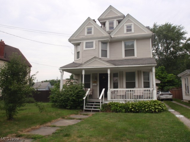 Lovely colonial with the simple charm of days gone by. Beautiful, natural woodwork on the first floor, leaded glass window in family room and master bedroom, pocket door separating the living and family rooms and bow windows in family room and master bedroom. Large kitchen with ample counter and cupboard space, dining area, built-in china cabinet and the range and refrigerator included with purchase. Full bath on first floor has shower over tub. The first floor bedroom is being used as a storage room at the present time. Upstairs there are 3 big bedrooms and full bath. The master bedroom can be configured to your needs - or possibly a nursery. Walk up attic too. Full basement is unfinished, but has laundry area and the washer and dryer are included with purchase.
Gorgeous, original wood front door and decorative fireplace in living room. The home was being used as a double prior to this owner and there are 2 furnaces and 2 electric panel boxes. Storage shed in backyard. Lo