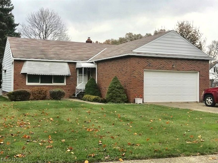 Welcome home to this absolute stunning 3 bedroom, 1.5 bathroom brick ranch with a large park-like setting yard! This well maintained home has a huge kitchen with all appliances included and an eat-in area perfect for family gatherings. The large living room has hardwood floors under the carpet along with all the bedrooms and hallway. In the lower level you will find a massive finished area with a custom bar which is ideal for entertaining. Some major updates include: Electric panel 2017, furnace 2014, air conditioning 2014, and newer windows. Home owner is also including a one year warranty! Will be city point of sale compliant! Call today to schedule your private tour as this one will not last long.