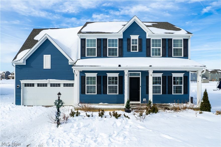 Built in 2020 and thoughtfully enhanced since, this exceptional residence blends modern sophistication with timeless design.
The open-concept main level was designed for both everyday living and effortless entertaining. At the heart of the home, a stunning chef’s kitchen showcases quartz countertops, stainless steel appliances, gas range, soft-close cabinetry, and extended-height upper cabinets for a seamless, elevated finish. An oversized eat-in island anchors the space and flows beautifully into the formal dining area and expansive great room, where walls of natural light and a gas fireplace create a warm yet refined atmosphere. A private first-floor office with French doors offers a quiet retreat for work or study. Luxury vinyl plank flooring spans the entire main level, complemented by a guest powder room. Just beyond the living space, step onto the rear deck with pergola  an inviting outdoor extension ideal for entertaining or unwinding. Upstairs, four generously sized bedrooms provide exceptional flexibility. The primary suite is a true retreat, featuring dual closets and a beautifully appointed en-suite bath with quartz vanity top and a spacious walk-in shower. A full bath with quartz counters and tub/shower combination serves the additional bedrooms.
The lower level is fully plumbed for an additional bath and ready to be finished to suit your vision whether recreation space, fitness area, or guest suite. Freshly painted throughout. Since purchase, the sellers thoughtfully added a fourth second-floor bedroom and installed new carpeting in the guest rooms, further enhancing functionality and comfort.
A refined, move-in ready home offering space, style, and lasting value.