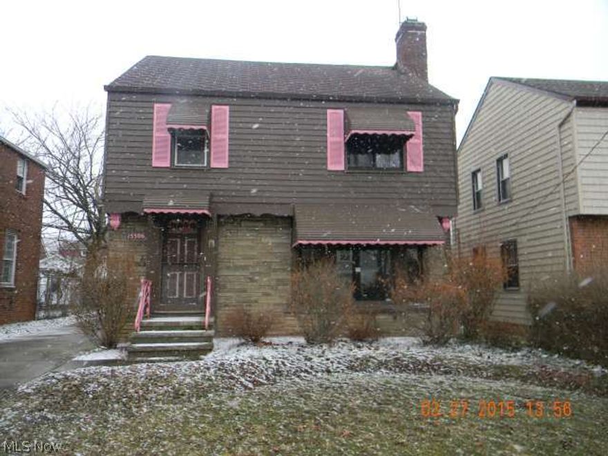 A beautiful brick, bay window, formal dining, long galley kitchen, great sunroom, partially finished rec room with a bar, 2 car garage, come see me!